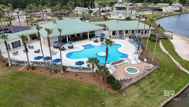 Located in Lake Osprey RV Resort, this RV lot offers access to a - photo 5