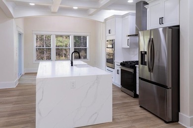 STUNNING new construction in the beautiful gated community of - photo 21