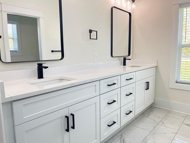 STUNNING new construction in the beautiful gated community of - photo 34