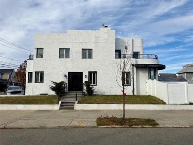 Discover coastal luxury in this beautifully renovated 4-bedroom - photo 1
