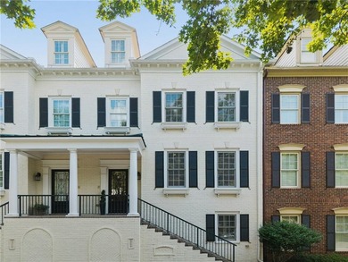 Set behind the gates of One Ivy Walk, this brick townhome offers - photo 6