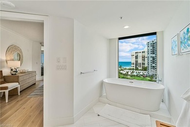 Indulge in a luxurious beachfront lifestyle in this exquisitely - photo 15