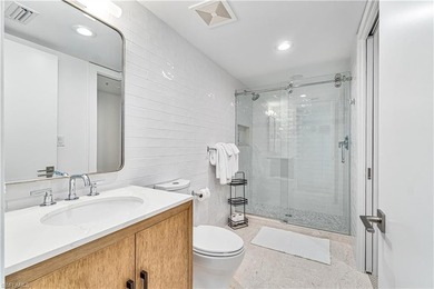Indulge in a luxurious beachfront lifestyle in this exquisitely - photo 17