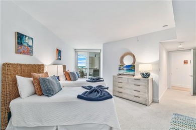 Indulge in a luxurious beachfront lifestyle in this exquisitely - photo 19