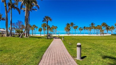 Indulge in a luxurious beachfront lifestyle in this exquisitely - photo 27