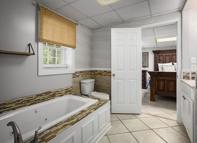 Enjoy lakefront living on Wilson Lake with 125' of waterfront, a - photo 35