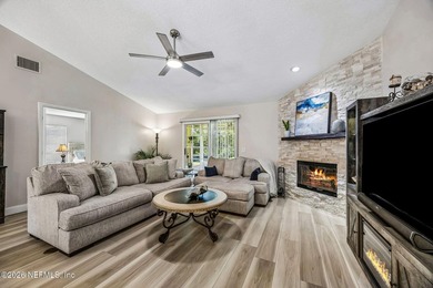 Beautifully remodeled in Hunters Green, this extensive - photo 12