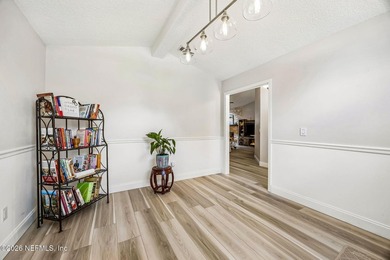 Beautifully remodeled in Hunters Green, this extensive - photo 15