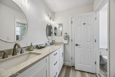 Beautifully remodeled in Hunters Green, this extensive - photo 18