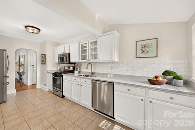 Welcome to 1808 Truman Rd, an updated home brimming with curb - photo 6