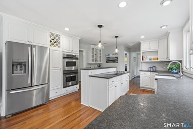 Centrally located yet private, this impeccably maintained - photo 16
