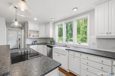 Centrally located yet private, this impeccably maintained - photo 17