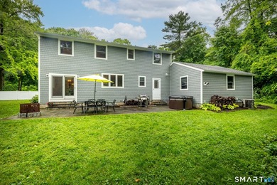 Centrally located yet private, this impeccably maintained - photo 22