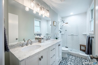 Centrally located yet private, this impeccably maintained - photo 27