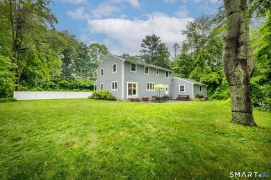Centrally located yet private, this impeccably maintained - photo 35