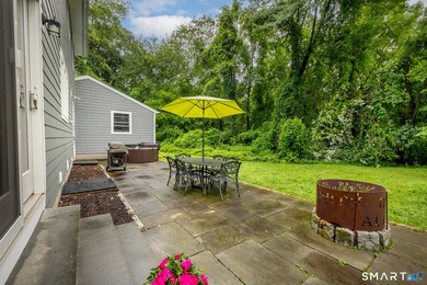Centrally located yet private, this impeccably maintained - photo 36