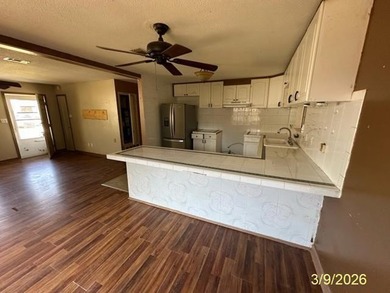 This brick home is competitively priced and located just 1.5 - photo 5