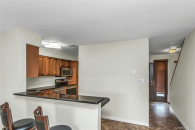 Welcome to Oceanside Cove! This beautifully maintained 2-bedroom - photo 3