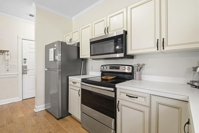 Welcome to this beautiful first-floor end-unit condo in the - photo 11