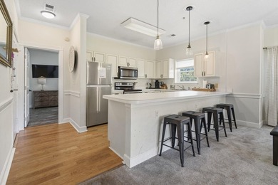 Welcome to this beautiful first-floor end-unit condo in the - photo 12
