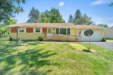 Welcome to 4089 N. Pine Dell Dr in Lansing, a well-maintained - photo 2