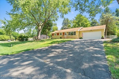 Welcome to 4089 N. Pine Dell Dr in Lansing, a well-maintained - photo 4