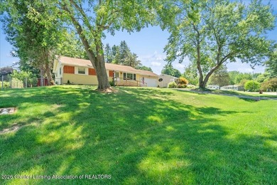 Welcome to 4089 N. Pine Dell Dr in Lansing, a well-maintained - photo 5