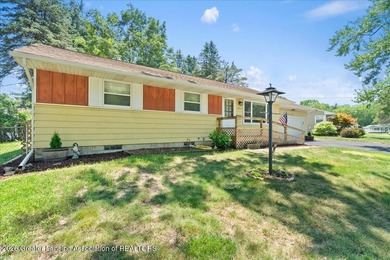 Welcome to 4089 N. Pine Dell Dr in Lansing, a well-maintained - photo 6