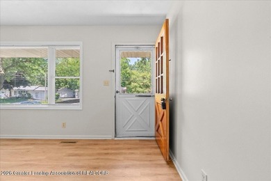 Welcome to 4089 N. Pine Dell Dr in Lansing, a well-maintained - photo 8