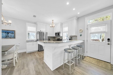 Ideally located just minutes from the sugar-white sands of the - photo 6