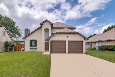 Welcome to this charming 3-bedroom, 2-bath home nestled in the - photo 1