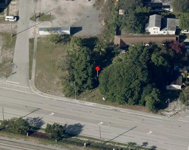 This 11,876 Sq. Ft. vacant land parcel is situated on 105' of - photo 3