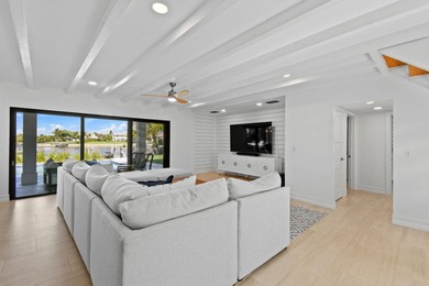 Set on one third of an acre with 90 feet of seawall just off the - photo 11