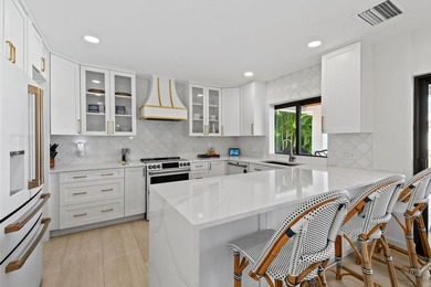 Set on one third of an acre with 90 feet of seawall just off the - photo 13