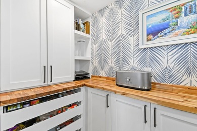 Set on one third of an acre with 90 feet of seawall just off the - photo 17