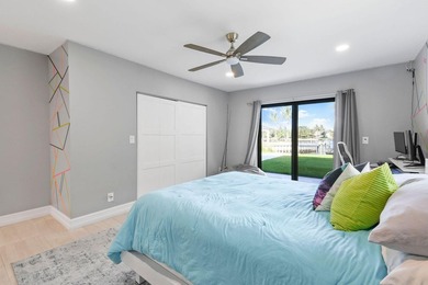 Set on one third of an acre with 90 feet of seawall just off the - photo 21