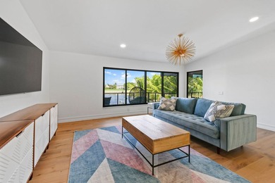 Set on one third of an acre with 90 feet of seawall just off the - photo 25