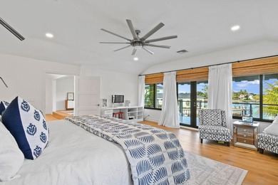Set on one third of an acre with 90 feet of seawall just off the - photo 28