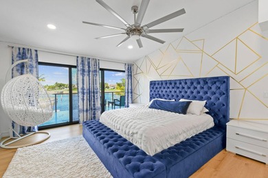 Set on one third of an acre with 90 feet of seawall just off the - photo 33