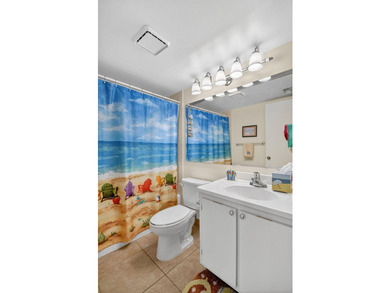 This corner unit, located on the 2nd floor, boasts impact glass - photo 34