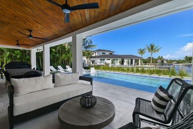 Set on one third of an acre with 90 feet of seawall just off the - photo 41