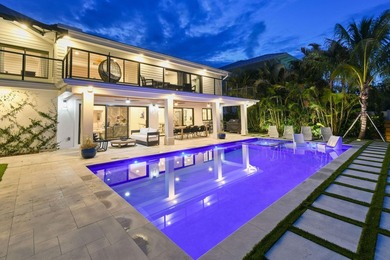 Set on one third of an acre with 90 feet of seawall just off the - photo 46