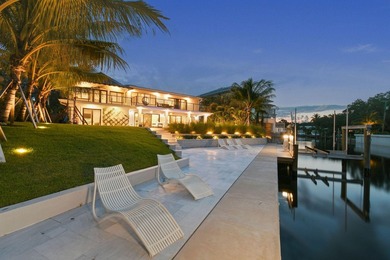 Set on one third of an acre with 90 feet of seawall just off the - photo 49