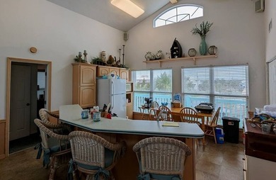 Relaxed coastal charm awaits in this 2-bedroom, 2-bath home on - photo 11