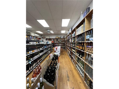 Exceptional Opportunity: Profitable Turnkey Liquor Store for - photo 4