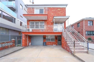 Introducing a beautifully maintained brick two-family home in - photo 1