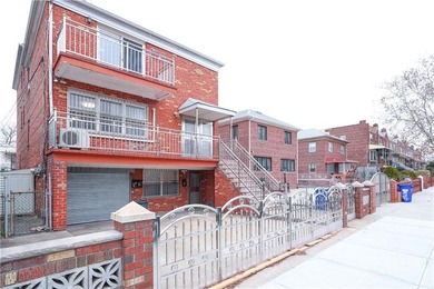 Introducing a beautifully maintained brick two-family home in - photo 4