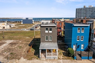 Live the coastal dream and earn from it! This fully renovated - photo 1