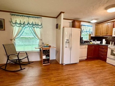Tucked away in a 1 acre +/- wooded setting, this 3 bedroom - photo 4