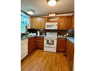 Tucked away in a 1 acre +/- wooded setting, this 3 bedroom - photo 5
